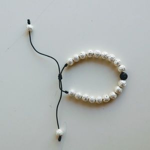 Silver lava stone bracelet adjustable